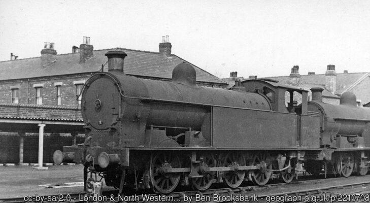 Heading a line of ex-LNW locomotives awaiting scrap is 0-8-2T No. 7892, which had spent it much of its life shunting in the marshalling yard at Speke, near Liverpool. (See also SJ6955 : London & North Western Webb 2-4-2T on Scrap Line at Crewe Works).