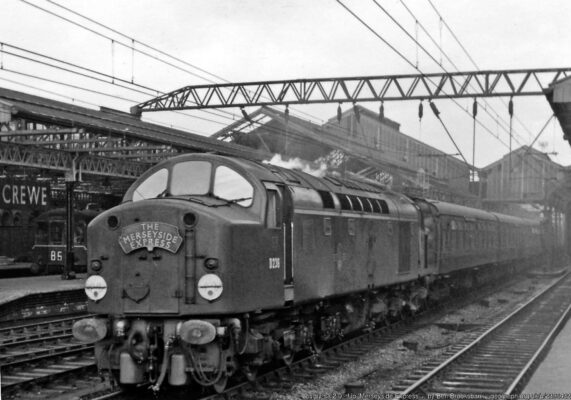 View northward, towards Liverpool, also Carlisle on the WCML, Manchester etc., in 1960 during the early stages of dieselisation of the principal trains on the WCML and soon after Crewe - Manchester had been electrified. Seen from Platform 5, running on the Up Through is No. D236 on the 10.05 Liverpool Lime Street - Euston 'Merseyside Express', an early candidate to be elevated to haulage, but not yet accelerated, by the new English-Electric 2,000 hp Type 4 1-Co-Co-1 Diesels (later Class 40).
